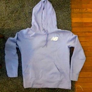Barely worn, semi cropped New Balance hoodie in a periwinkle color